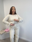 SWETER Z KOKARDKĄ KREMOWY